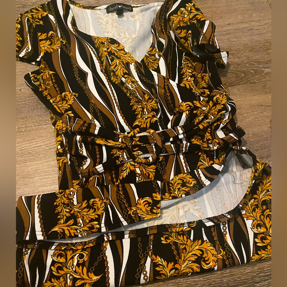 Cute detailed black white and gold and brown dress